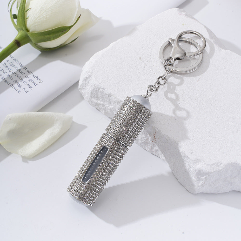Wholesale  diamond-studded creative perfume bottle keychain is easy to carry